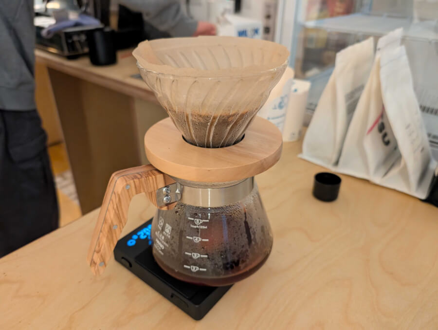 Close-up of a pour-over coffee dripper.